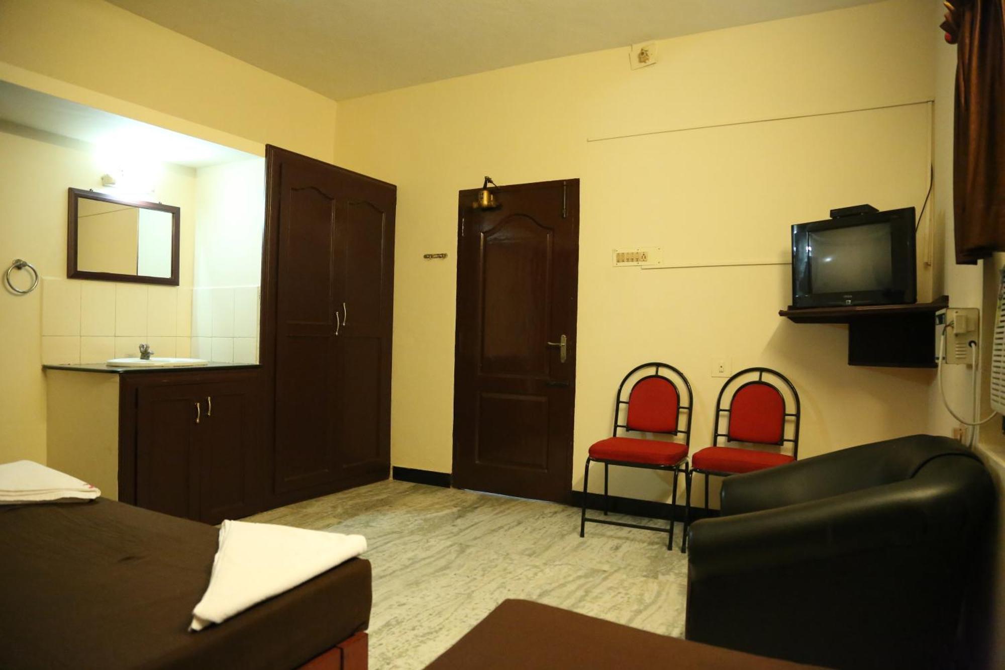 Rmc Travellers Inn Chennai Room photo